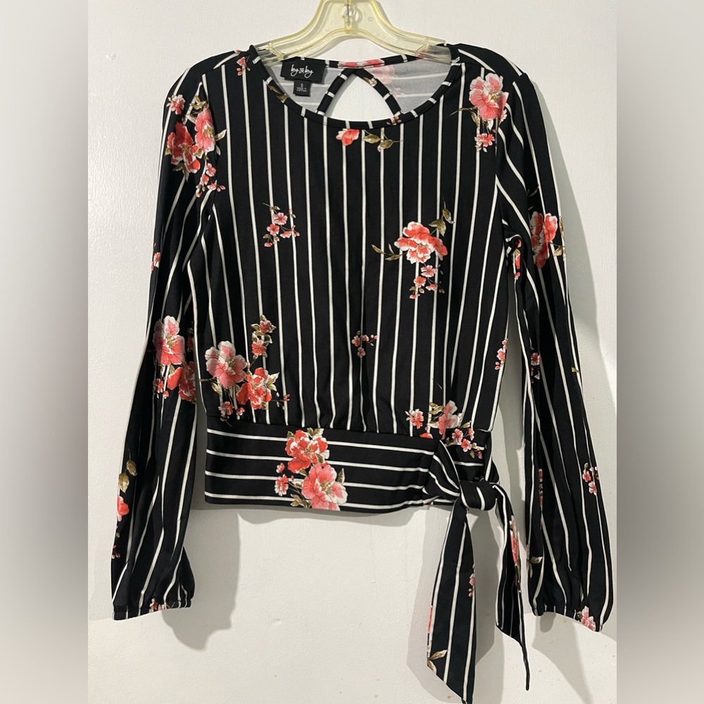 Black floral blouse.